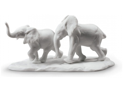 Following The Path Elephants Sculpture. White