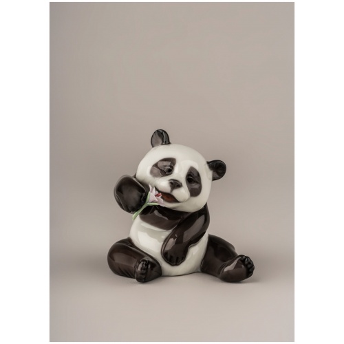 A Cheerful Panda Figurine 9