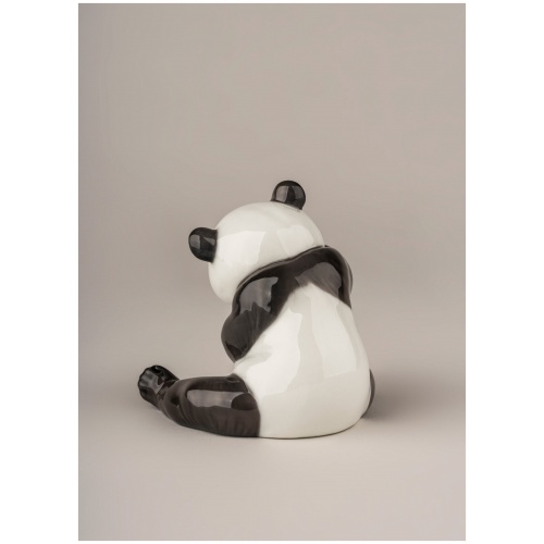 A Cheerful Panda Figurine 6