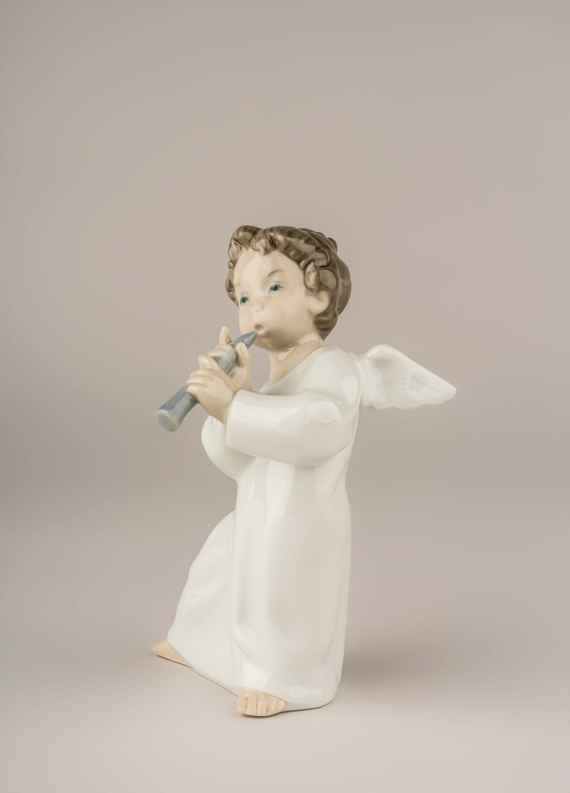 Angel with Flute Figurine 9 Angel with Flute Figurine 9